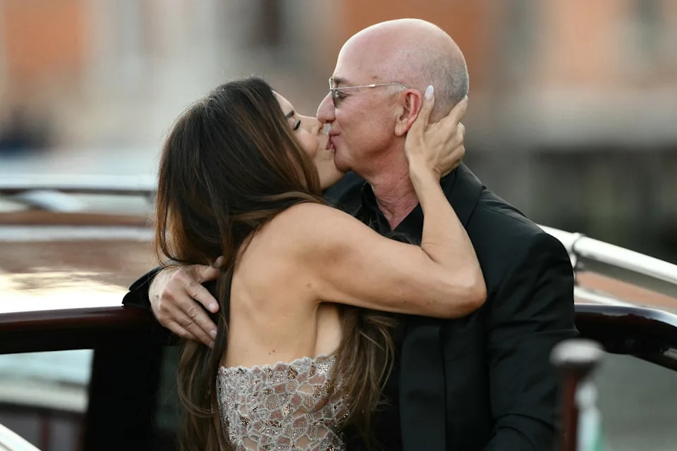 Amazon founder Jeff Bezos and Lauren Sanchez have been friends with the Kardashian-Jenner family for years (AFP via Getty Images)