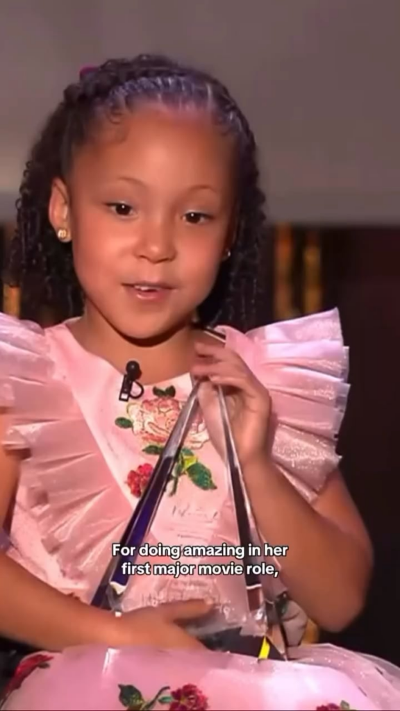 Cesily Collette Taylor presenting Marissa Bode with the Christopher Reeve Acting Award on-stage at the 2025 Media Access Awards