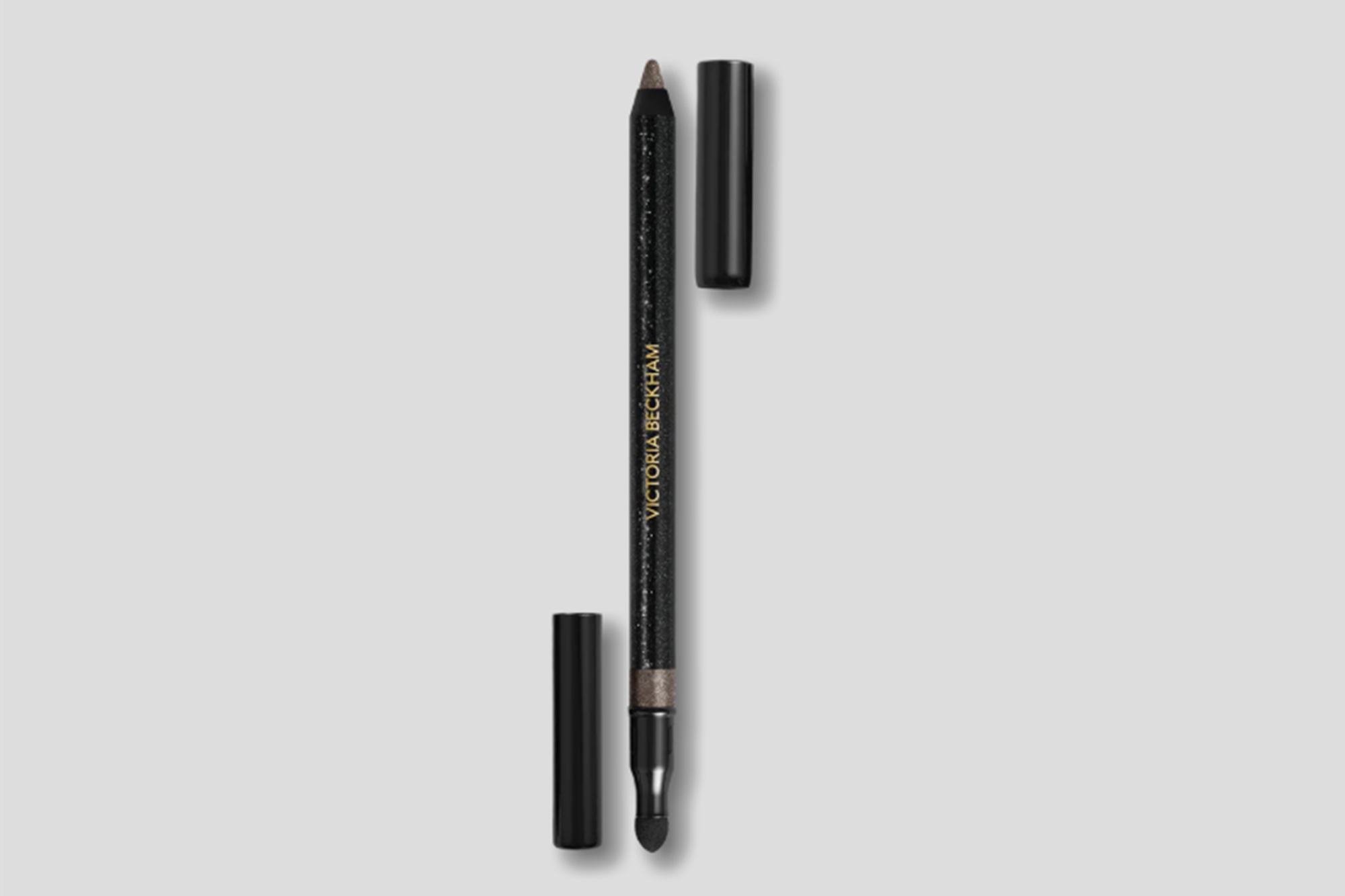 Victoria Beckham eyeliner pencil in a metallic shade with a smudger on one end.