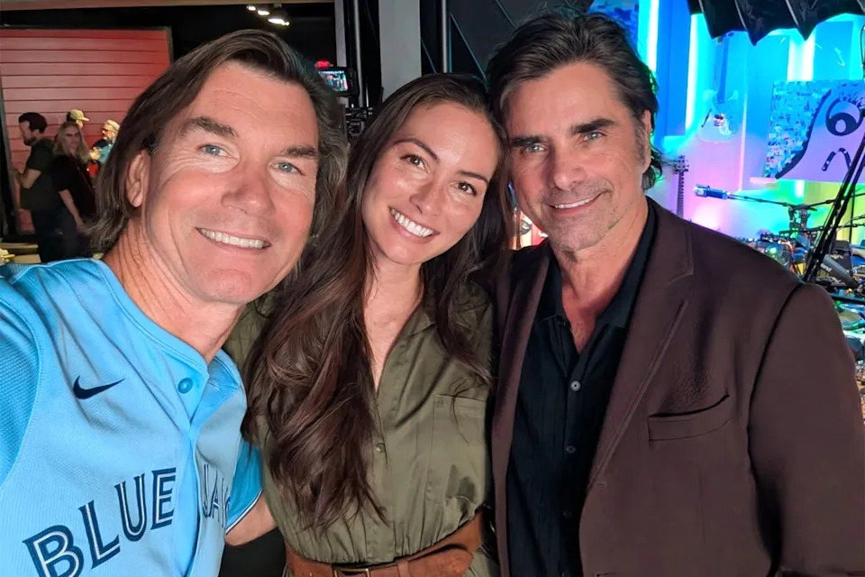 Jerry O'Connell/Instagram Jerry O'Connell, Caitlin McHugh, and John Stamos at Howie Mandel's 70th birthday party