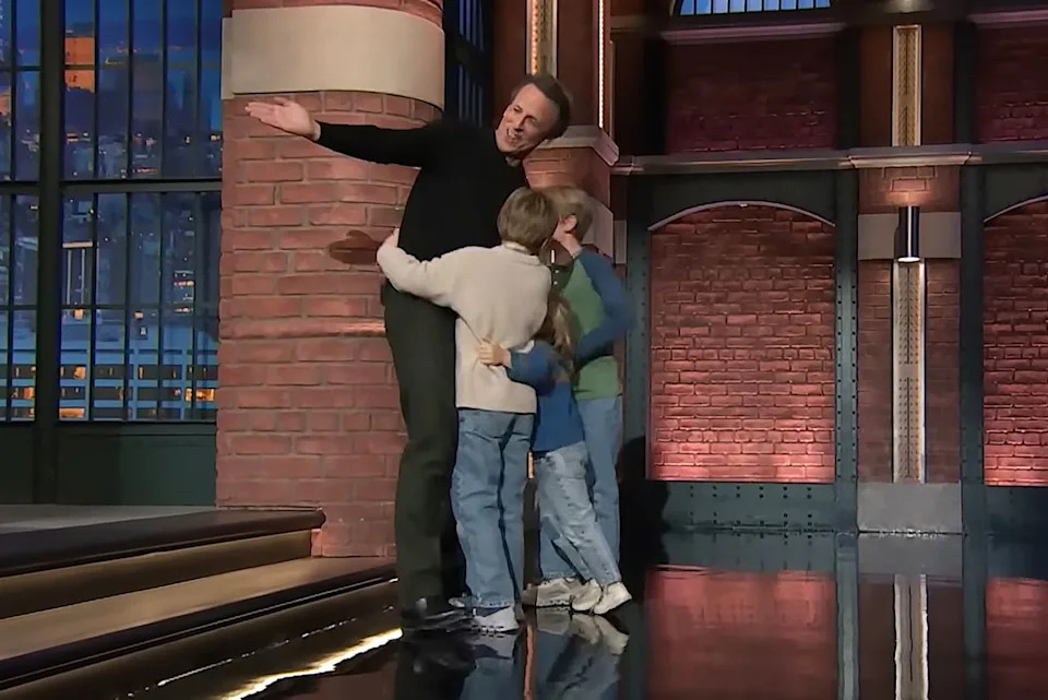 Late Night with Seth Meyers/Youtube Seth Meyers hugging his kids on stage.