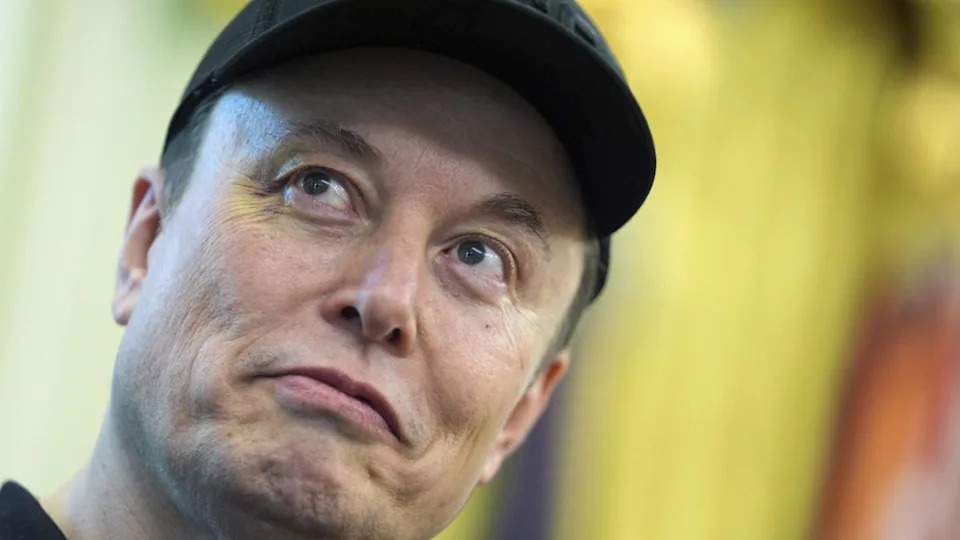 Elon Musk listens as President Donald Trump speaks during a news conference in the Oval Office of the White House, Friday, May 30, 2025, in Washington. (AP Photo/Evan Vucci)