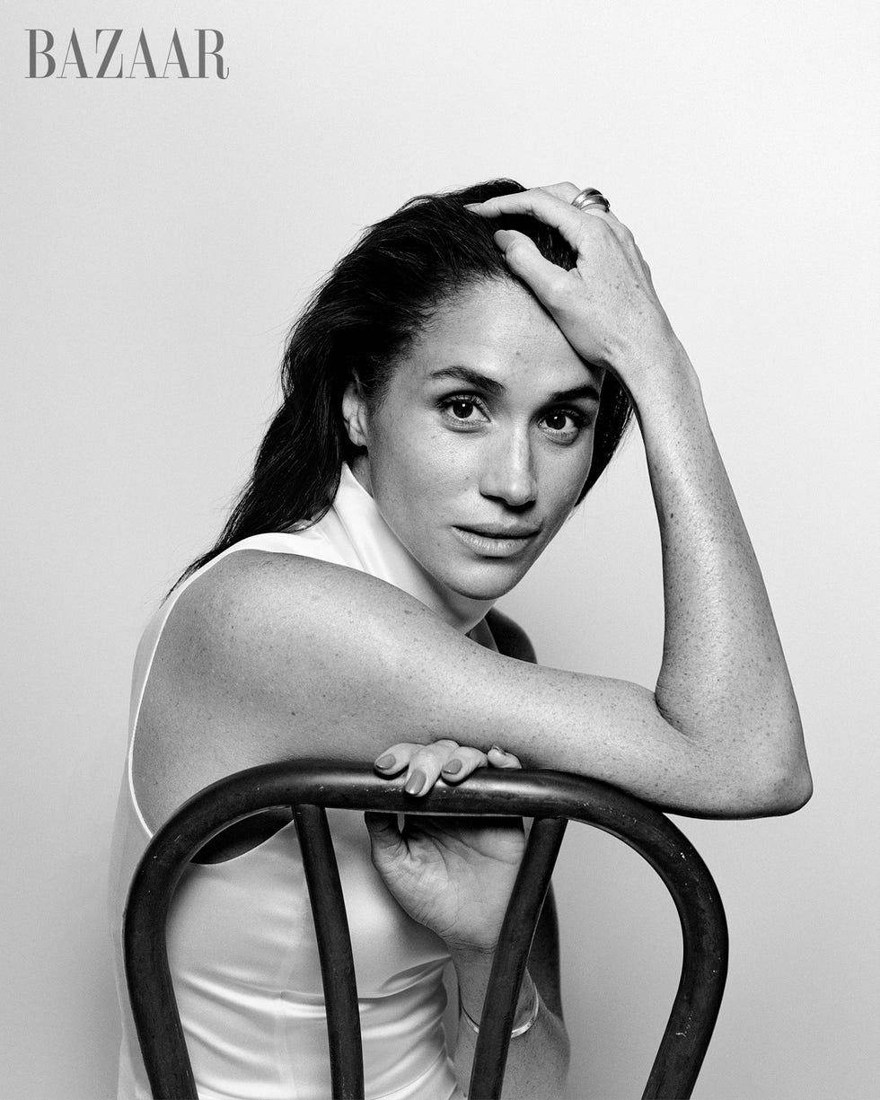 portrait featuring a seated individual resting on a chair portrait featuring a seated individual resting on a chair