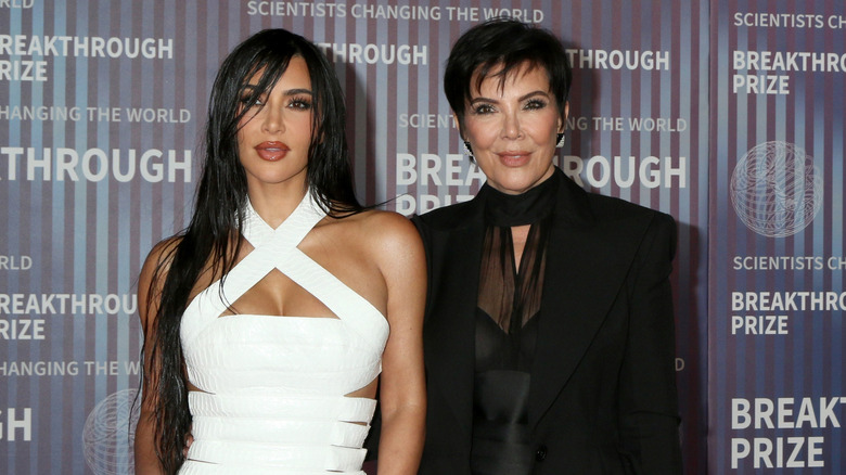 Kim Kardashian and Kris Jenner attend an event