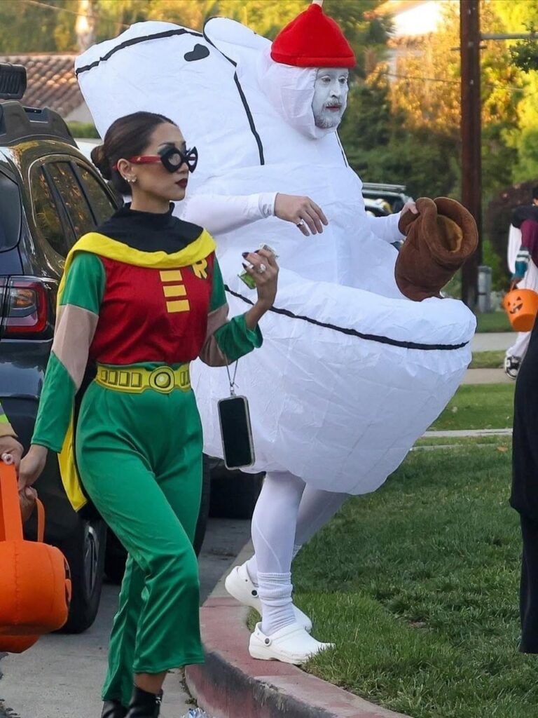 Macaulay Culkin and Brenda Song in costume for Halloween