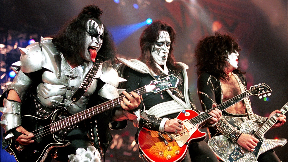 Members of the band KISS dressed in costume