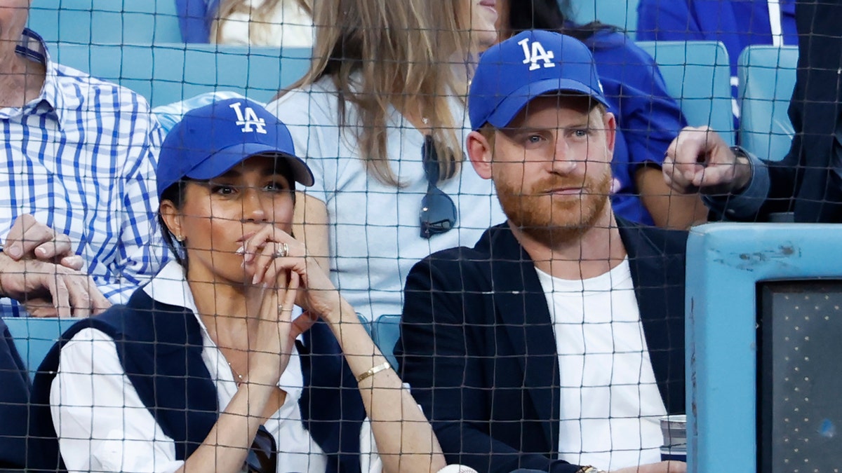Meghan Markle and Prince Harry attend the Dodgers game