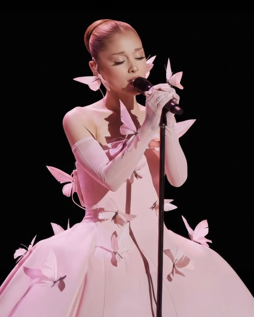 Ariana Grande wearing custom Robert Wun The Pink Butterfies couture lookat the Wicked: One Wonderful Night Special. Styled by Law Roach