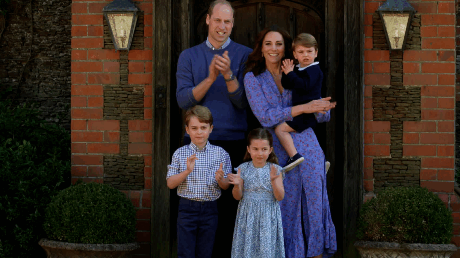 Princess Kate and Prince William at home with their children.