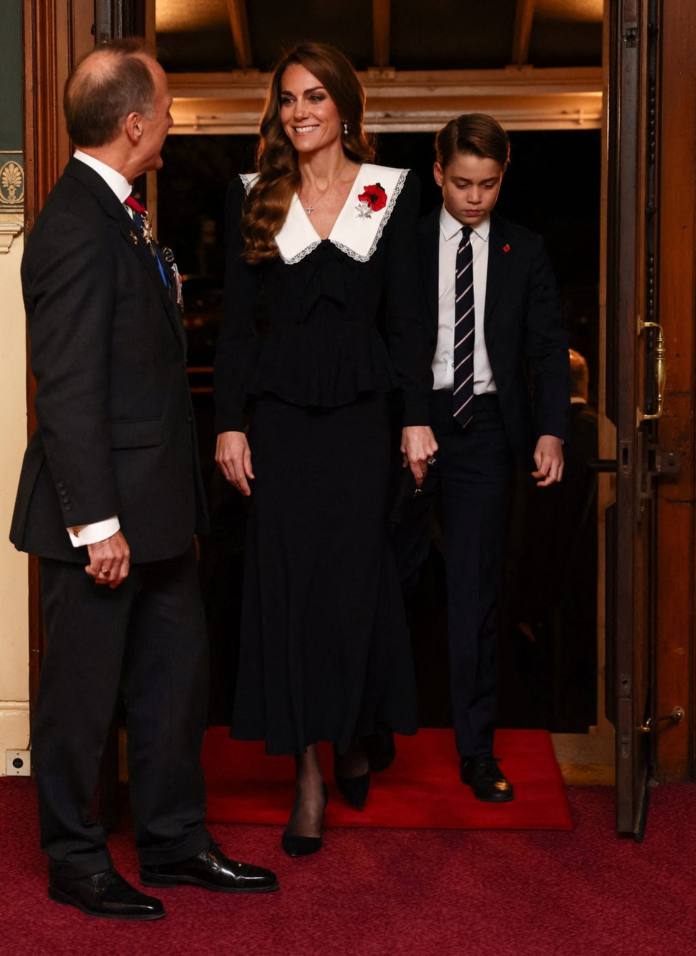BRITAIN-WAR-WWI-HISTORY-ROYALS britains catherine, princess of wales (l) and britains prince george of wales (r) arrive to attend the royal british legion festival of remembrance event at the royal albert hall, in london, on november 8, 2025 ahead of remembrance day commemorations. (photo by jack taylor / pool / afp) (photo by jack taylor/pool/afp via getty images)