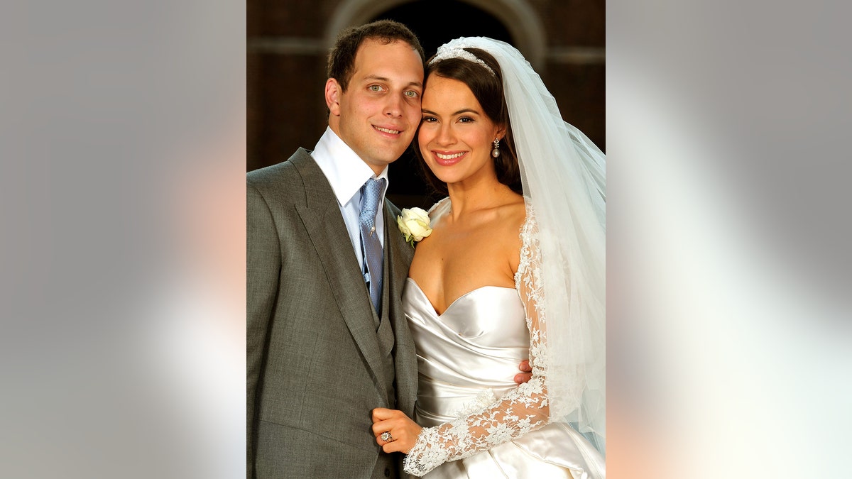 Sophie Winkleman smiling on her wedding day with the groom.