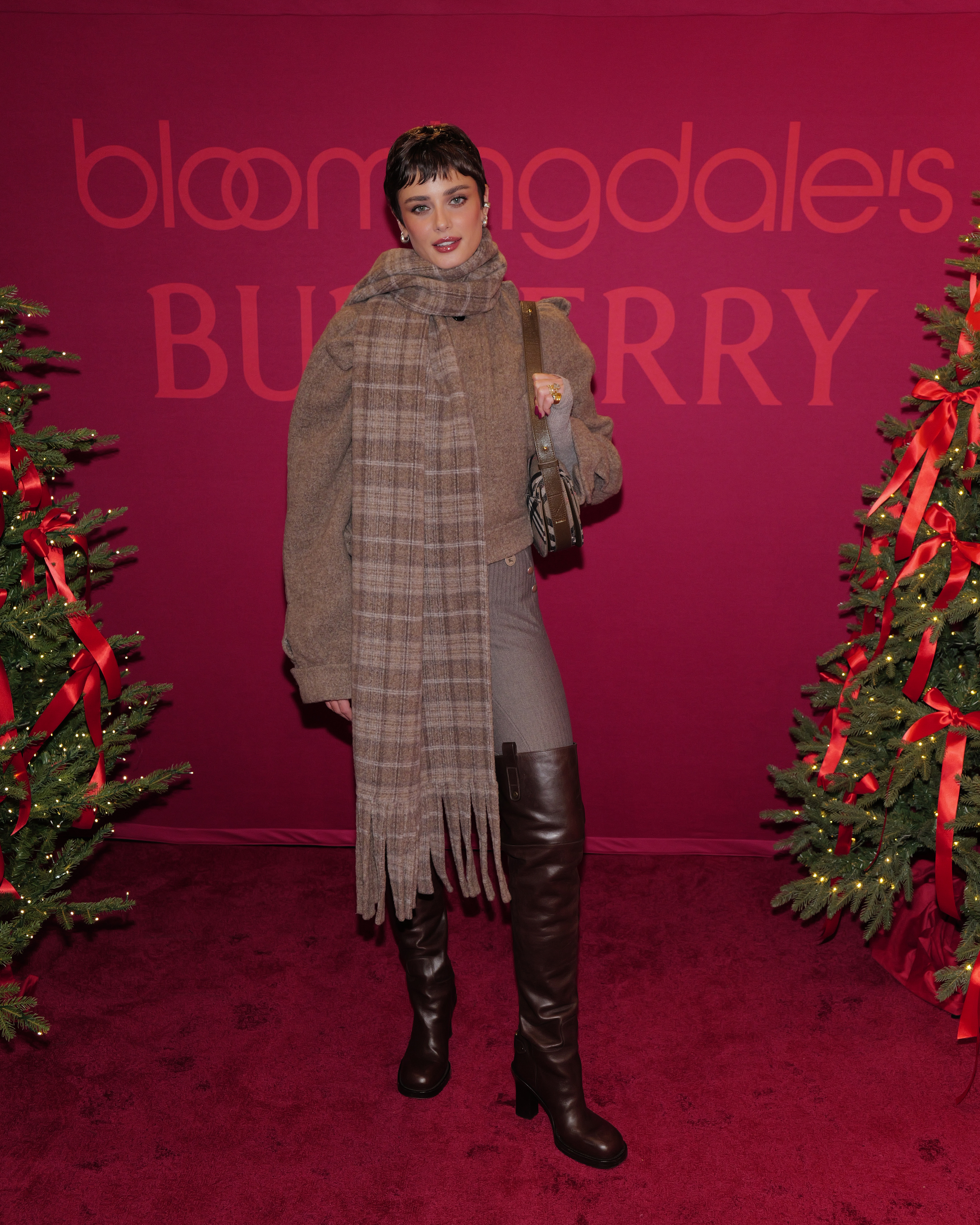 Taylor Hill attends as RAYE lights up New York at Bloomingdale's holiday window unveil with special partner Burberry at Bloomingdale's on November 19, 2025 in New York City.