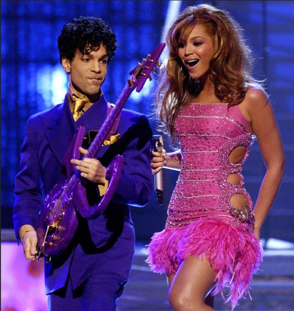 Throwback to the pink Roberto Cavalli dress Beyoncé wore for her Grammy’s performance with Prince in 2004