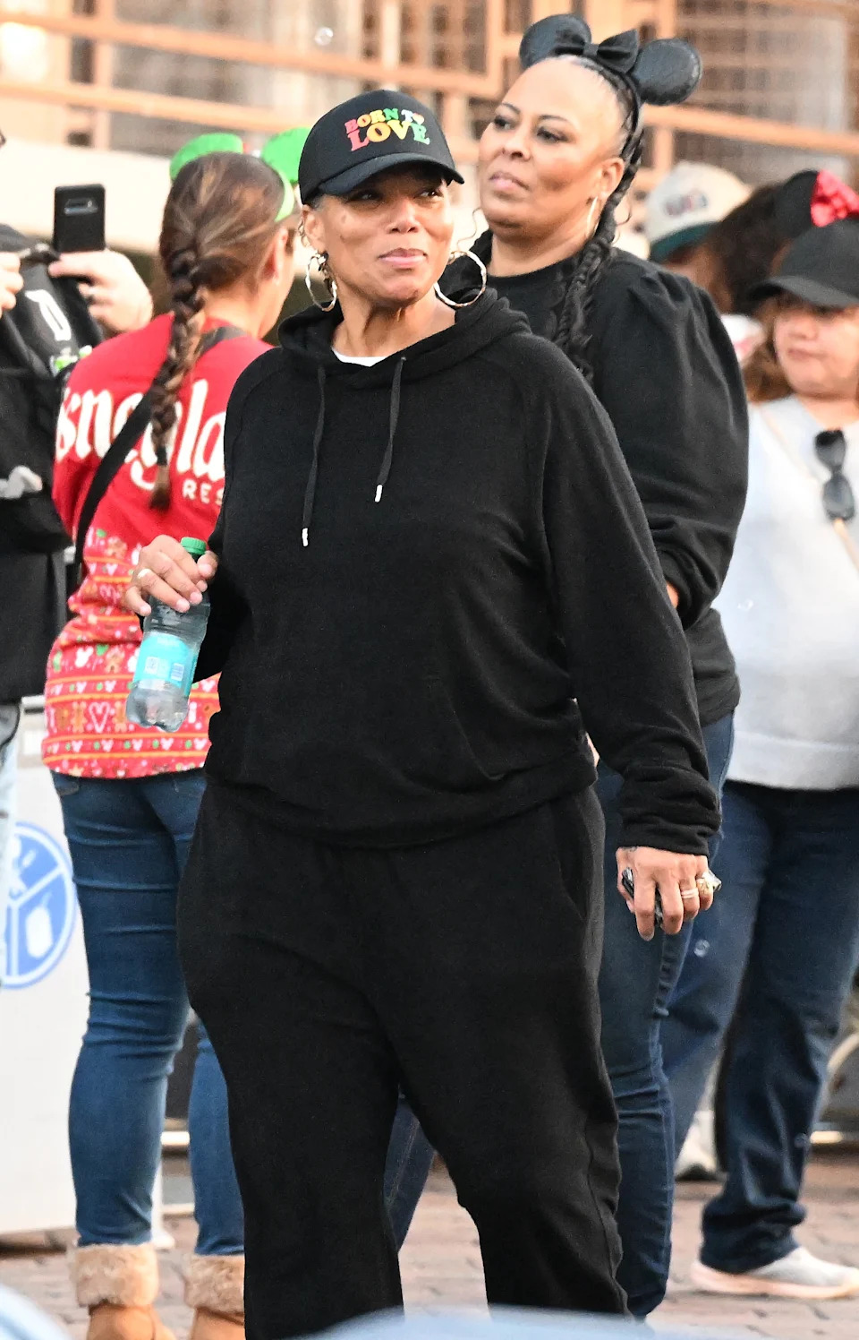 Latifah dressed casually for the fun-filled day, wearing a black hoodie and matching sweatpants. She also sported a black baseball cap that had the words “Born To Love” written in red, yellow and green. Snorlax / MEGA
