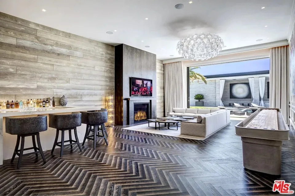 A bar and fireplace in Kylie Jenner's California home in Holmby Hills