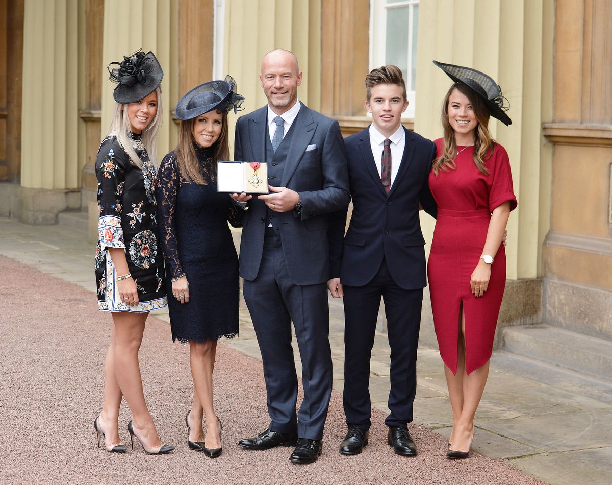 Alan Shearer with his family (left-right)  Hollie, Lainya (wife), Will and Chloe after he was presented with a CBE by the Duke of Cambridge, during an Investiture ceremony at Buckingham Palace on December 6, 2016 in London, England. 
