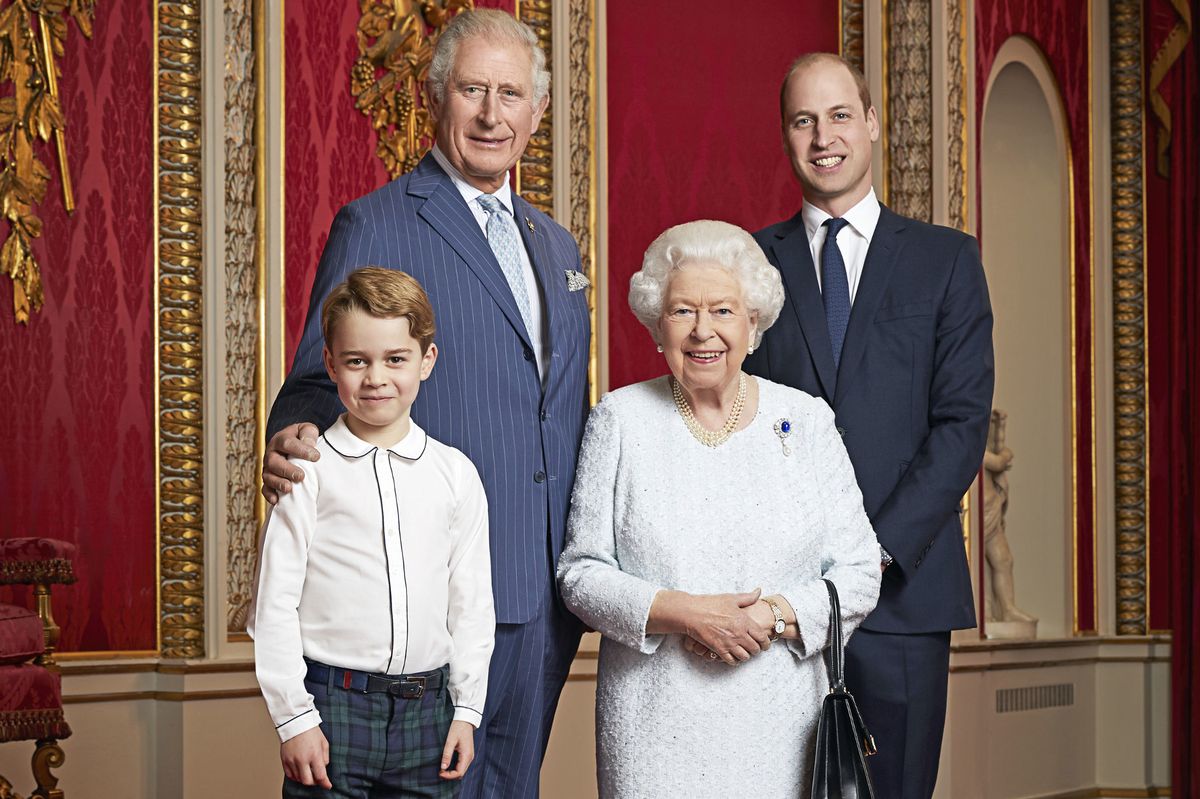 The late Queen Elizabeth II, Prince Charles, Prince William and Prince George in the throne room