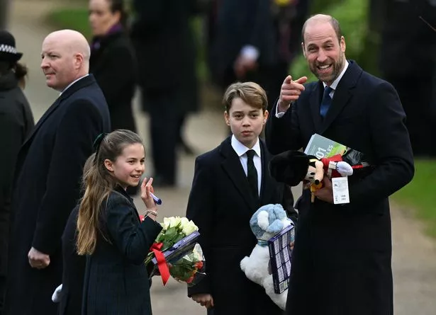 William with George and Charlotte looking at wellwishers