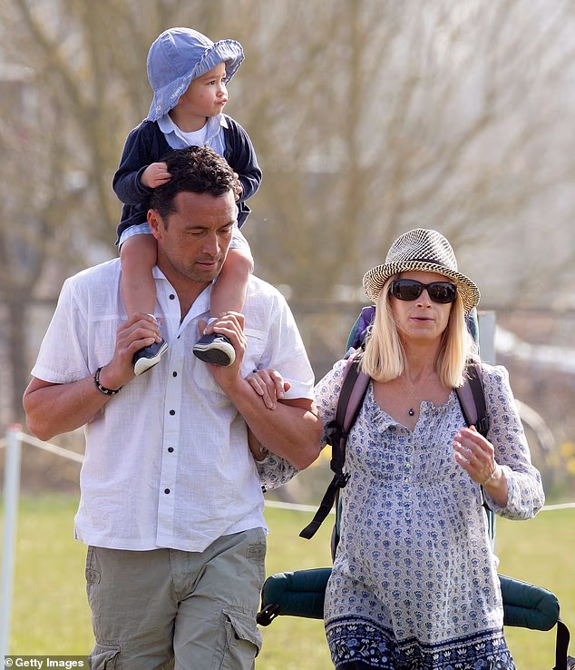 Gary carrying baby Senna on his shoulders as the family attended the Gatcombe Horse Trials at Gatcombe Park, Minchinhampton on March 24, 2012 in Stroud, England