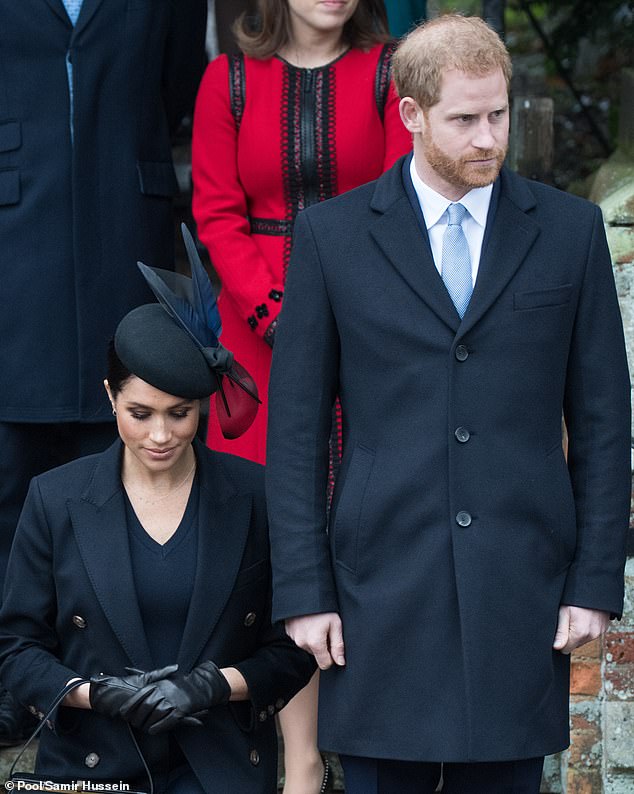 Ms James told the Daily Mail that Meghan (pictured curtseying for the Queen outside of the church) was able to 'steer Harry' via a strategic hand placement and what appears to be her 'taking control of the choreography'