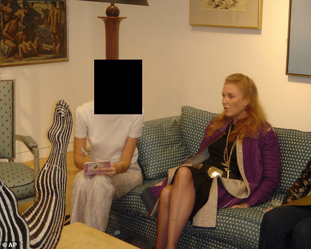 Sarah Ferguson sits on a sofa in an undated photograph released by the US Department of Justice