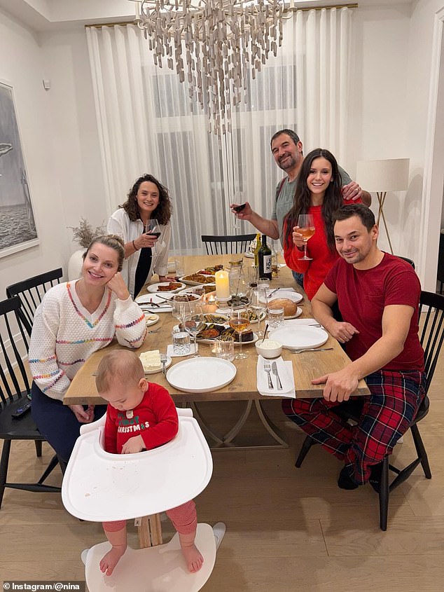 Nina's family appeared to be gathered for a nicer dinner, but they also celebrated with another refreshingly low-key dinner in which most of the guests were dressed in casual clothes — and even pajamas