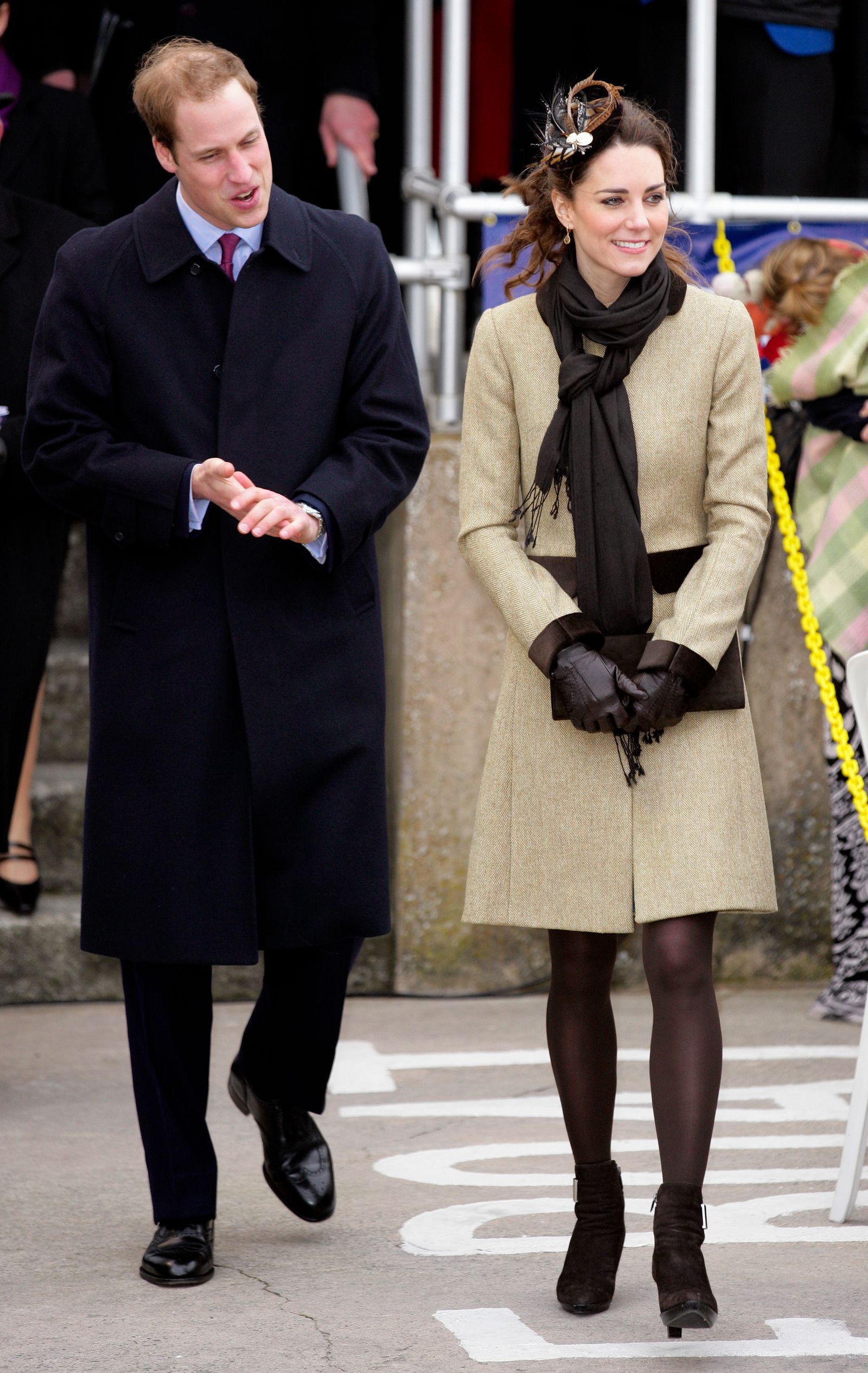 Image may contain Prince William Duke of Cambridge Person Clothing Coat Adult Scarf and Teen