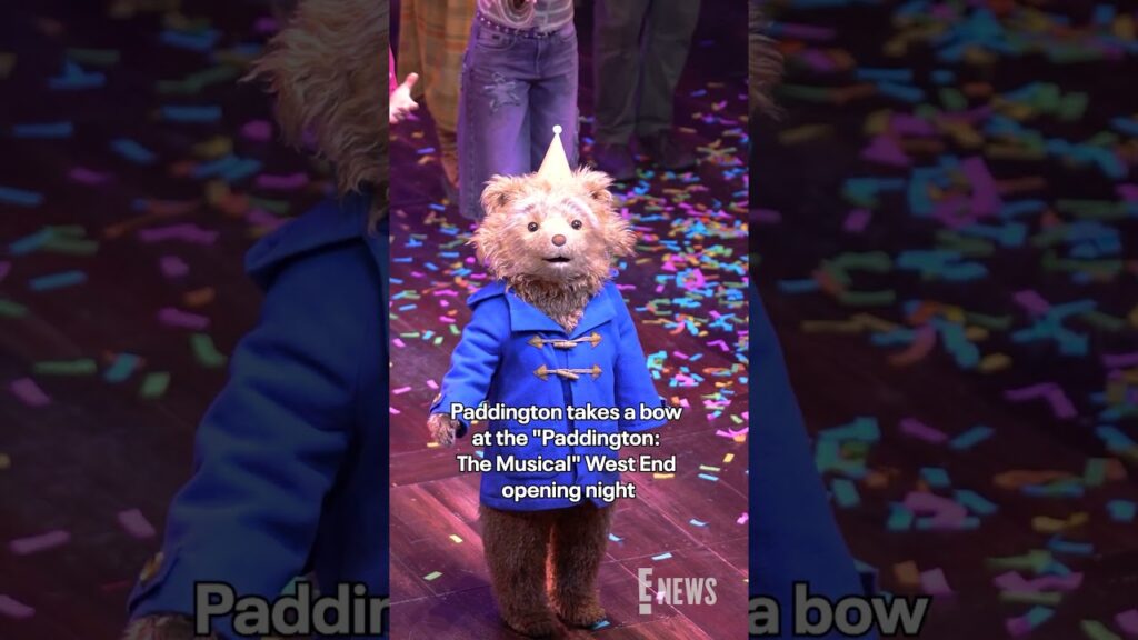Paddington, played in costume by Arti Shah and voiced by James Hameed, takes a bow. Paddington, played in costume by Arti Shah and voiced by James Hameed, takes a bow.