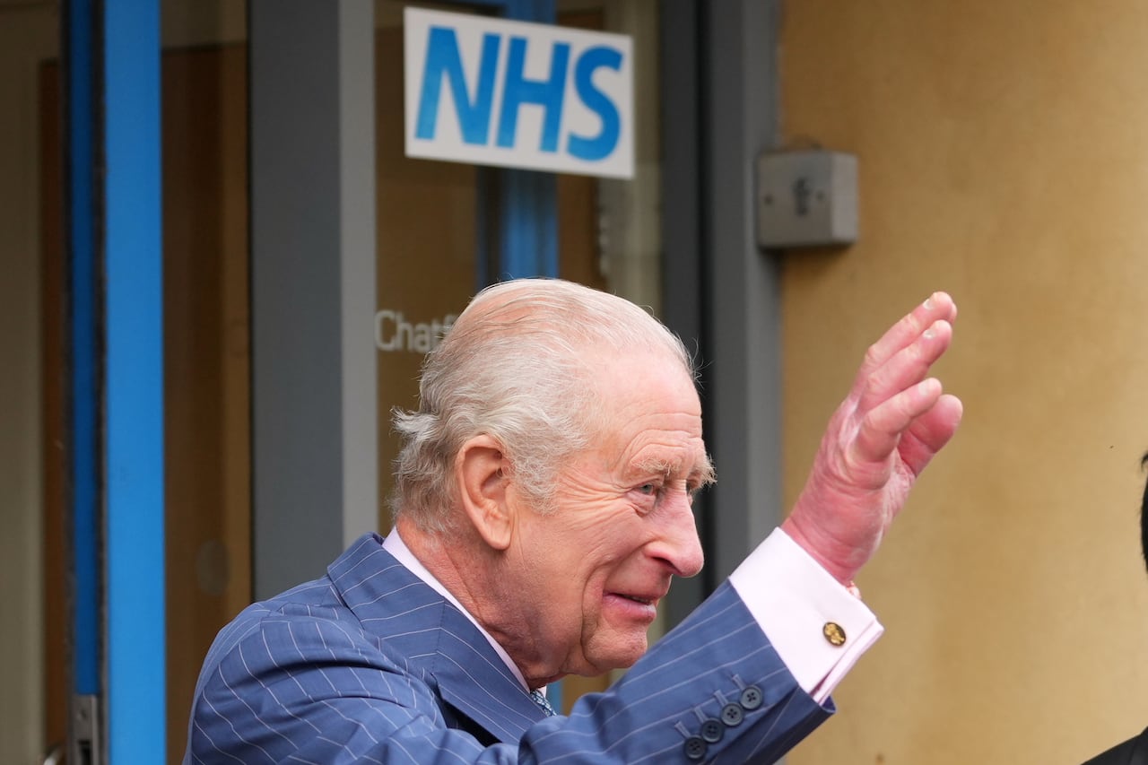 King Charles waves