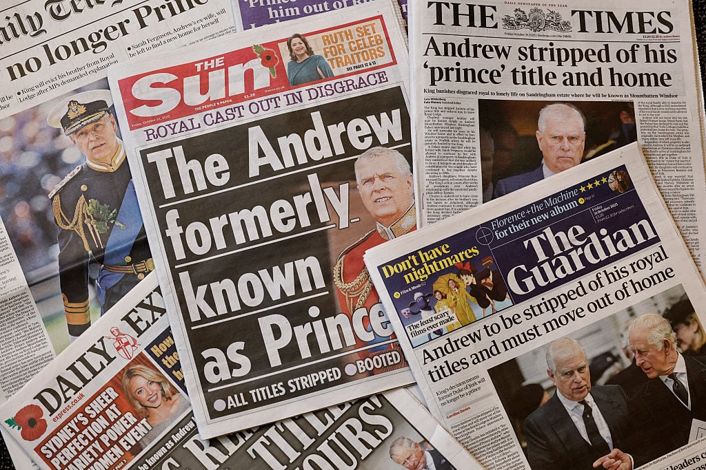A collection of newspaper front pages.