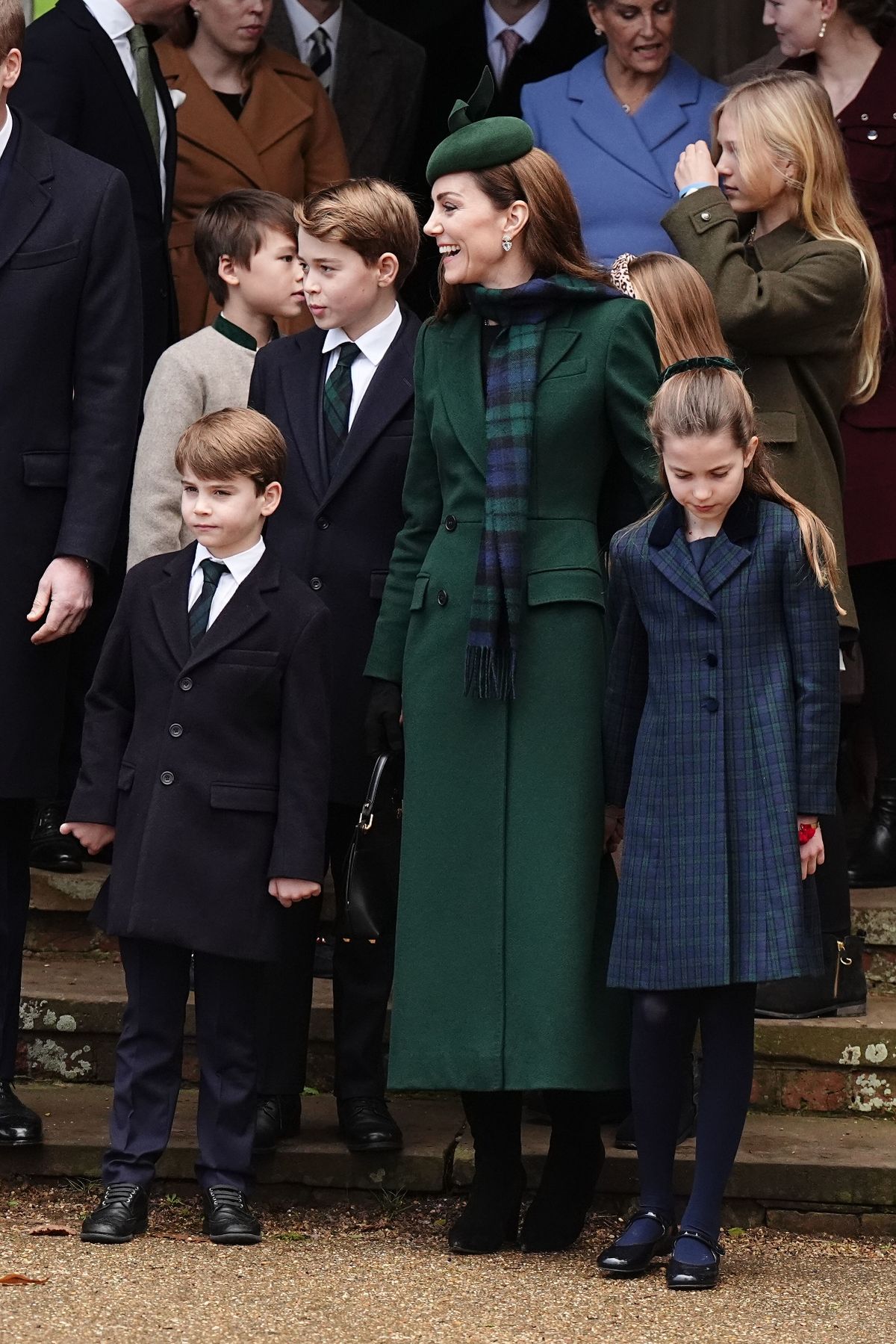 Kate wore a green coat by Sarah Burton for Alexander McQueen 