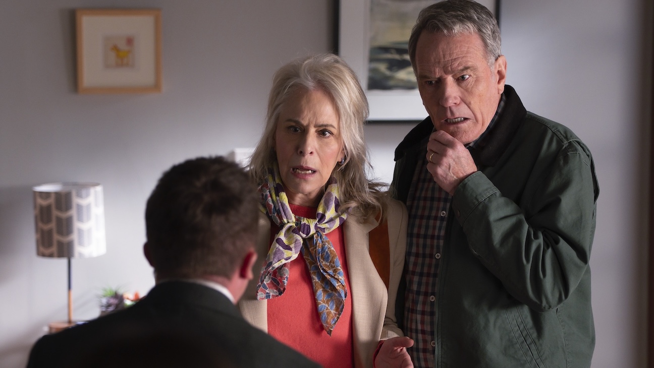 Frankie Muniz with back to camera, Jane Kaczmarek and Bryan Cranston in Malcolm in the Middle: Life’s Still Unfair