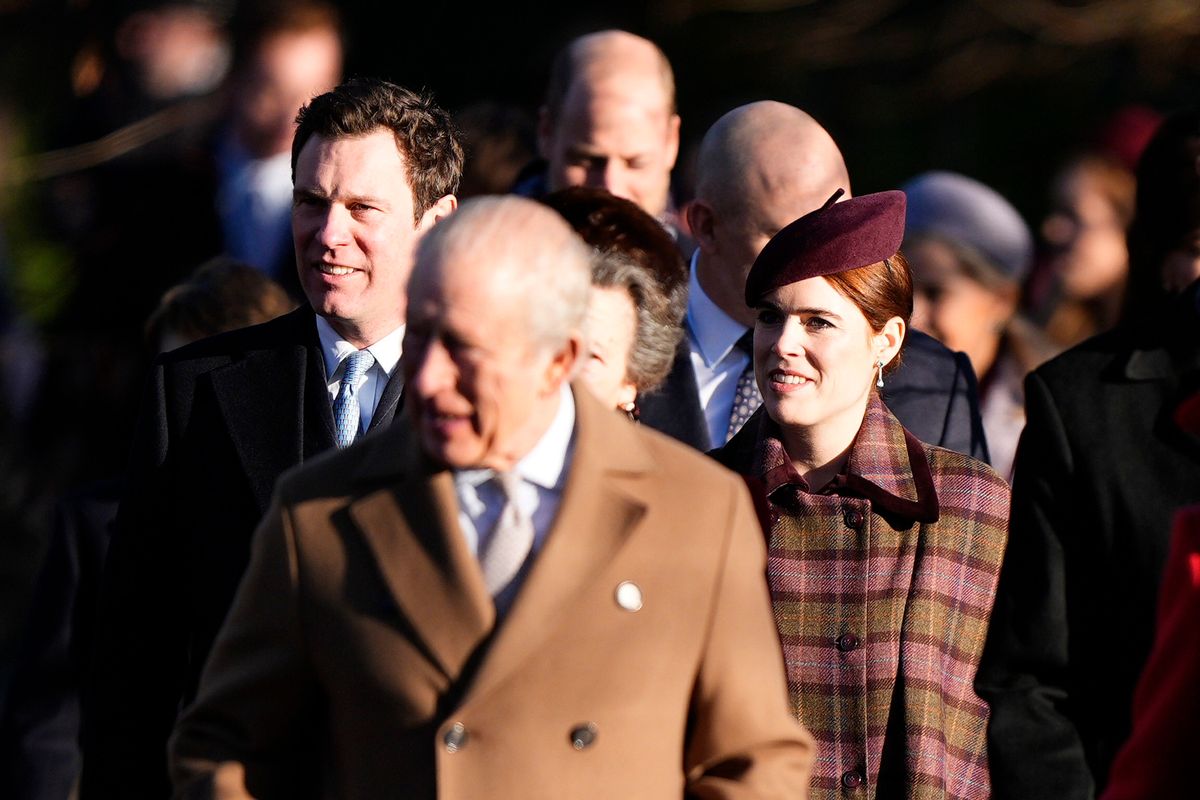 Princess Eugenie and husband Jack Brooksbank walk behind the King on the way to church