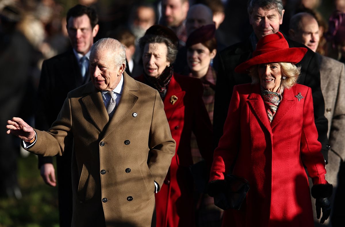 The King walks to church with Queen Camilla in Sandringham earlier today 