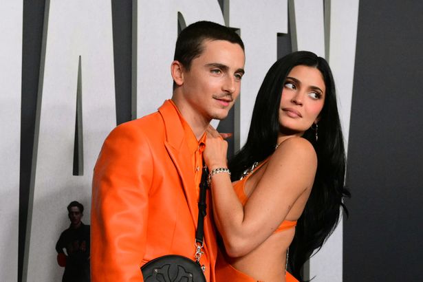 Chalomet and jenner in orange at film premiere