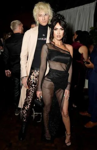 Presley Ann/Getty Machine Gun Kelly and Megan Fox attend the GQ Men of the Year Party