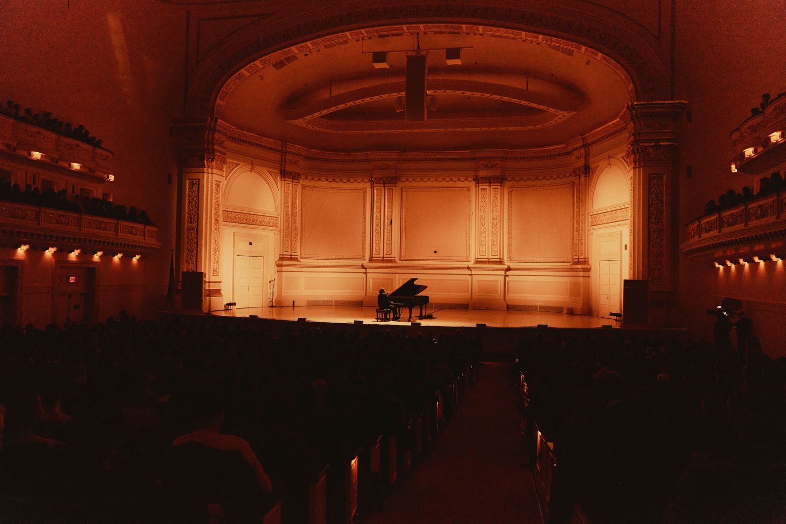 Image may contain Architecture Building Indoors Theater Auditorium Hall Person Adult and Keyboard