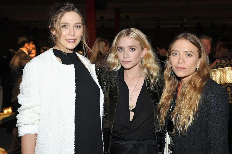 Donato Sardella/Getty Elizabeth Olsen, Ashley Olsen, and Mary Kate Olsen in 2016