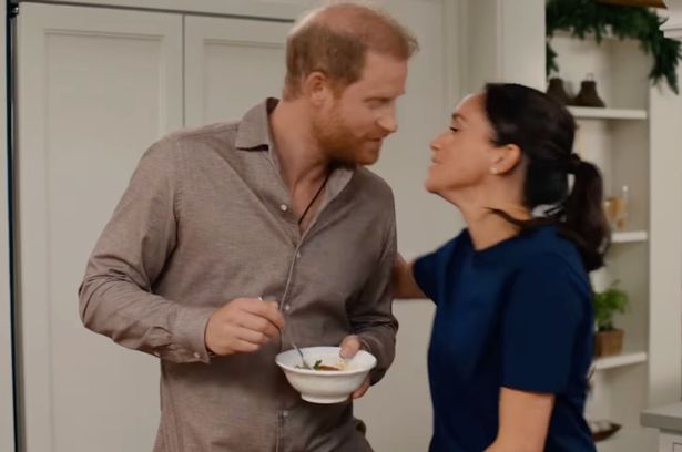 Harry and Meghan share a kiss in the show 