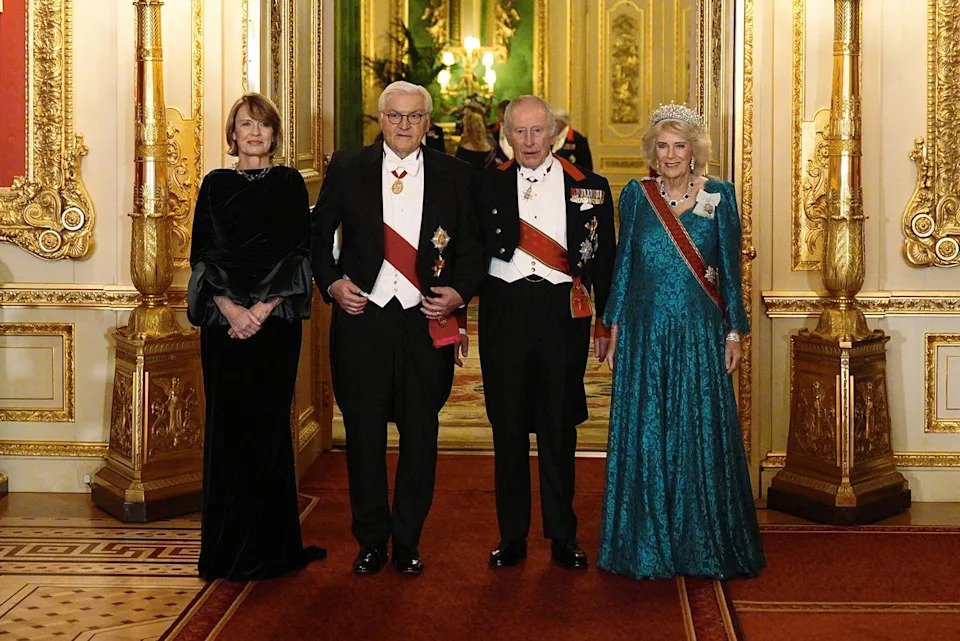  Aaron Chown / POOL / AFP via Getty  Elke Buedenbender, Germany's President Frank-Walter Steinmeier, King Charles and Queen Camilla on Dec. 3, 2025