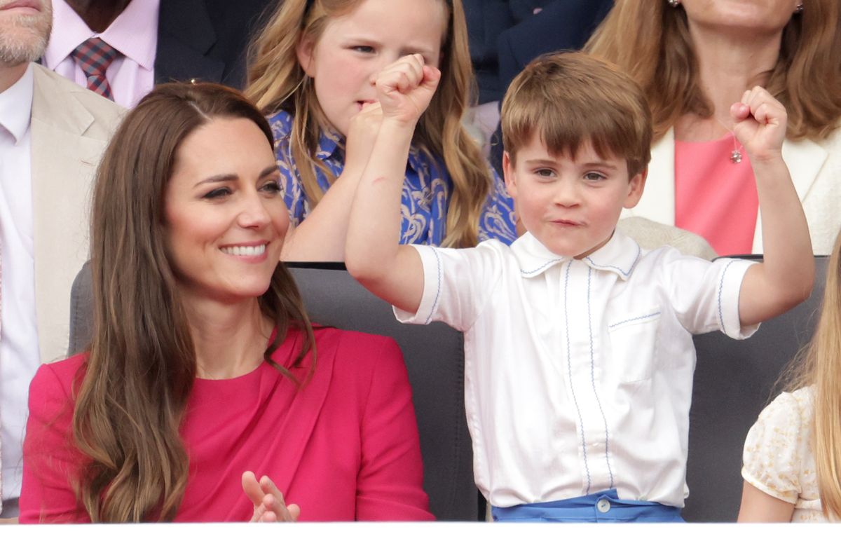 Prince Louis dancing at the Platinum Jubilee next to smiling Kate Middleton