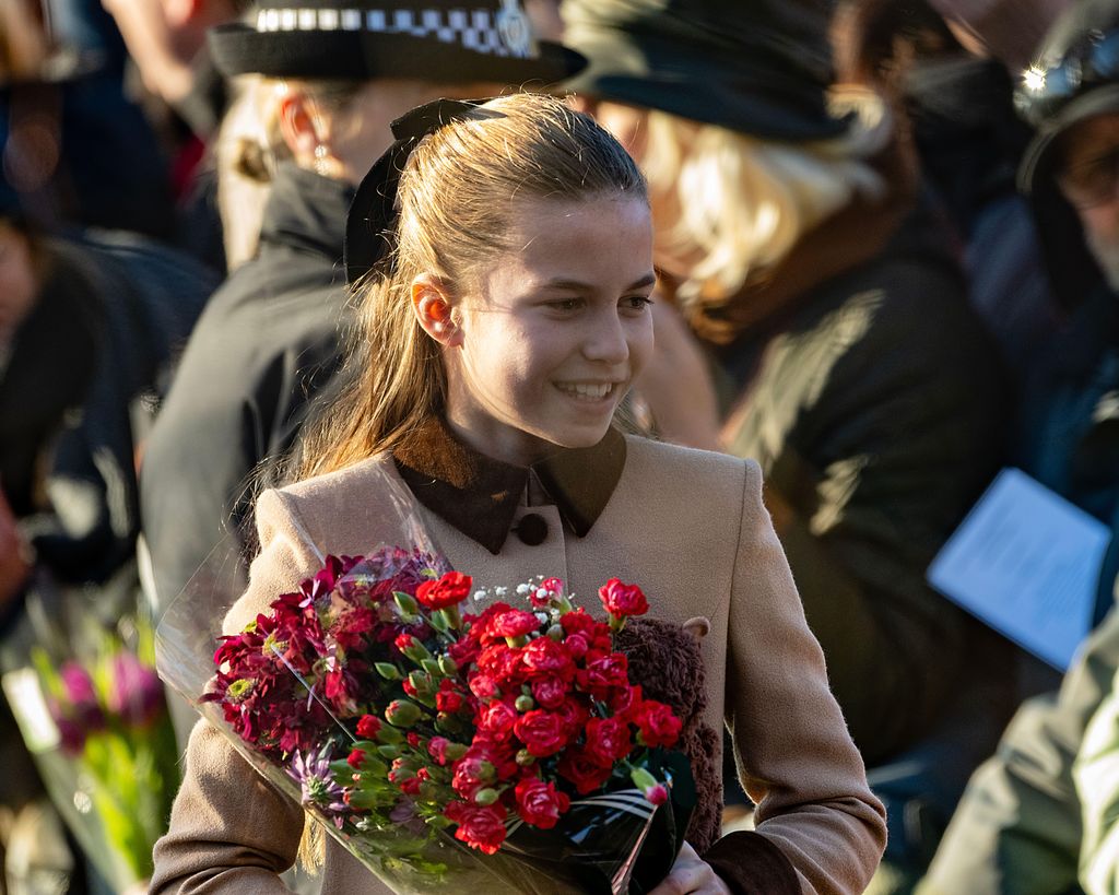 Princess Charlotte holding flowers
