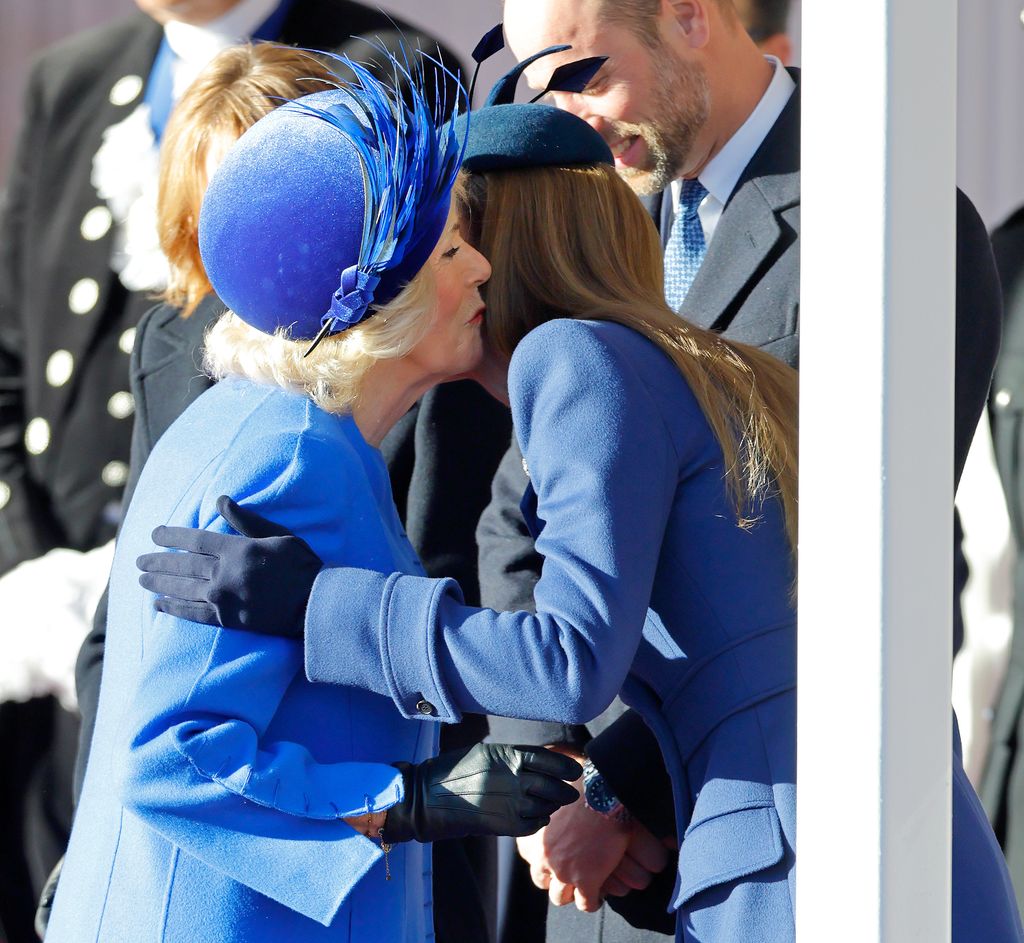 Queen Camilla kisses Kate Middleton
