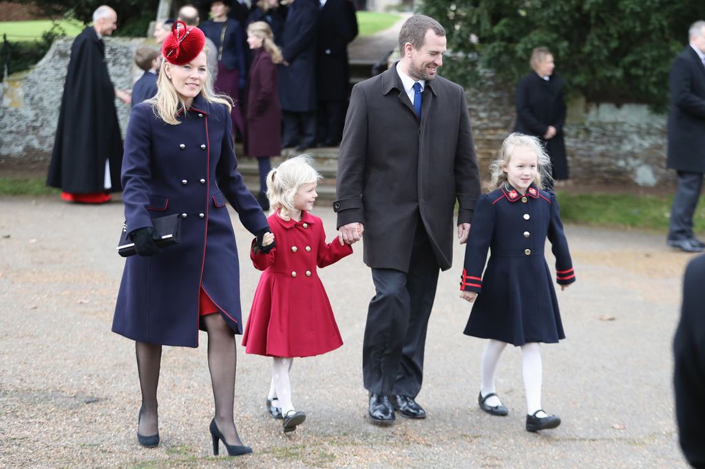 Savannah Phillips with parents and sister walking away from church
