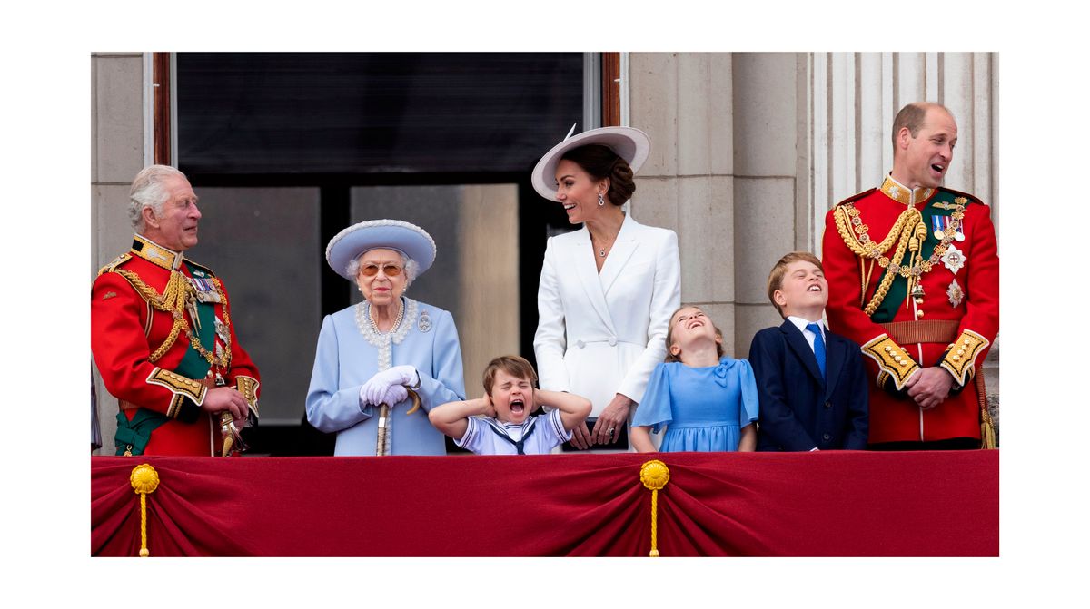 Prince Louis screaming with his fingers in his ears while stood next to Queen Elizabeth II during the Platinum Jubilee fly-past at Buckingham Palace