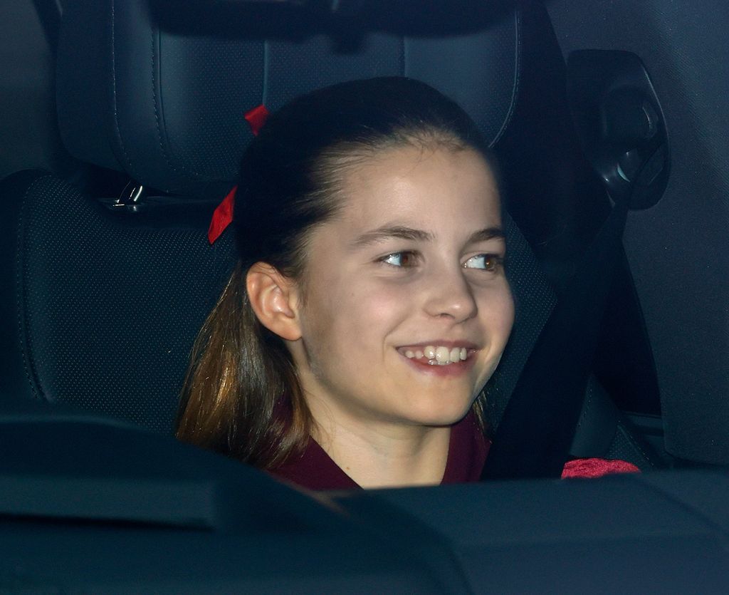 Princess Charlotte in car smiling