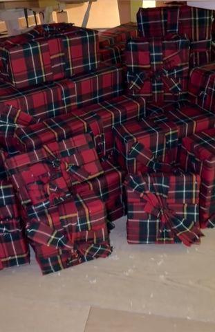 Kim Kardashian/Instagram Kim Kardashian's 2025 Christmas gift-wrapping is from the SKIMS pajama holiday collection