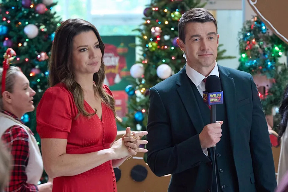 Kimberley Sustad and Robert Buckley