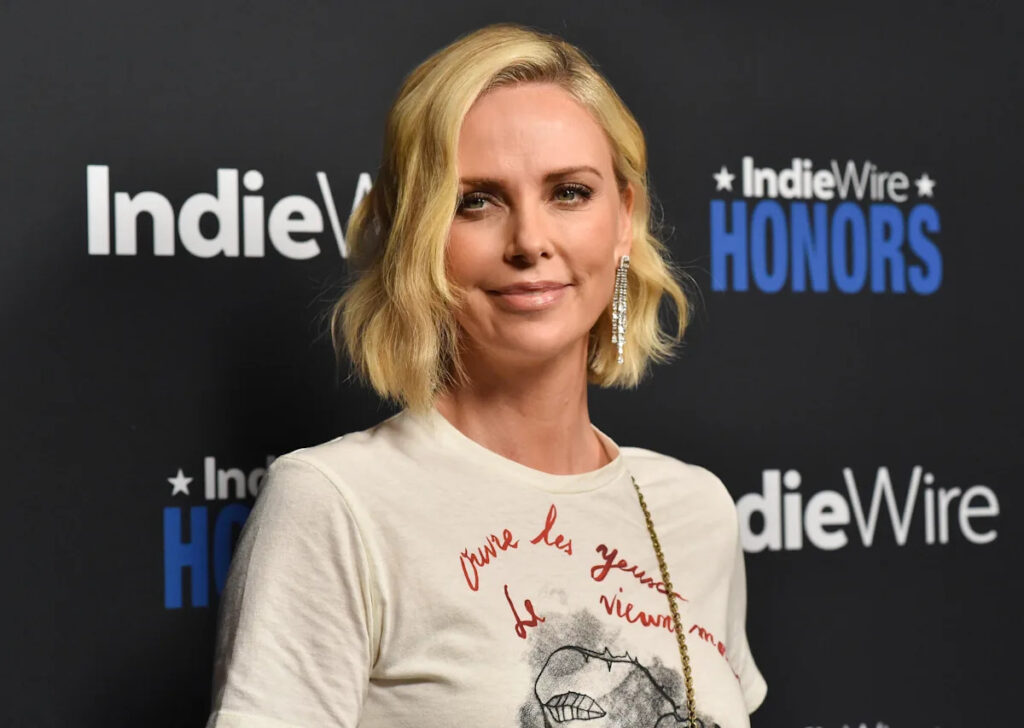Charlize Theron Made Fans’ Jaws Drop In a Completely Sheer, Black Lace Catsuit: ‘Oh What a Night’ Yahoo entertainment home