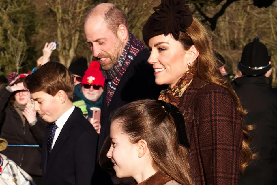 The Prince and Princess of Wales walk to church with their children (AP)